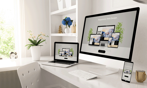 Responsive website displayed on three different devices.